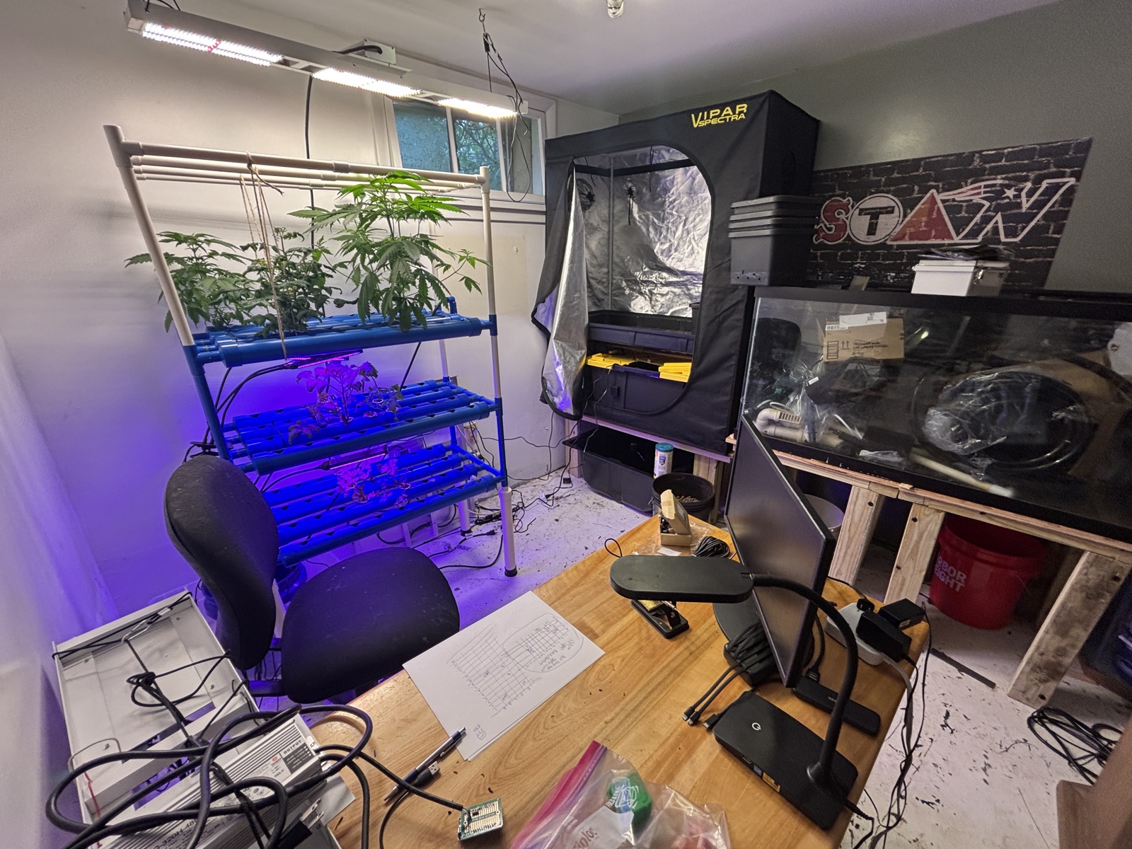 The lab in operation — NFT running, tent in the back, everything glowing
