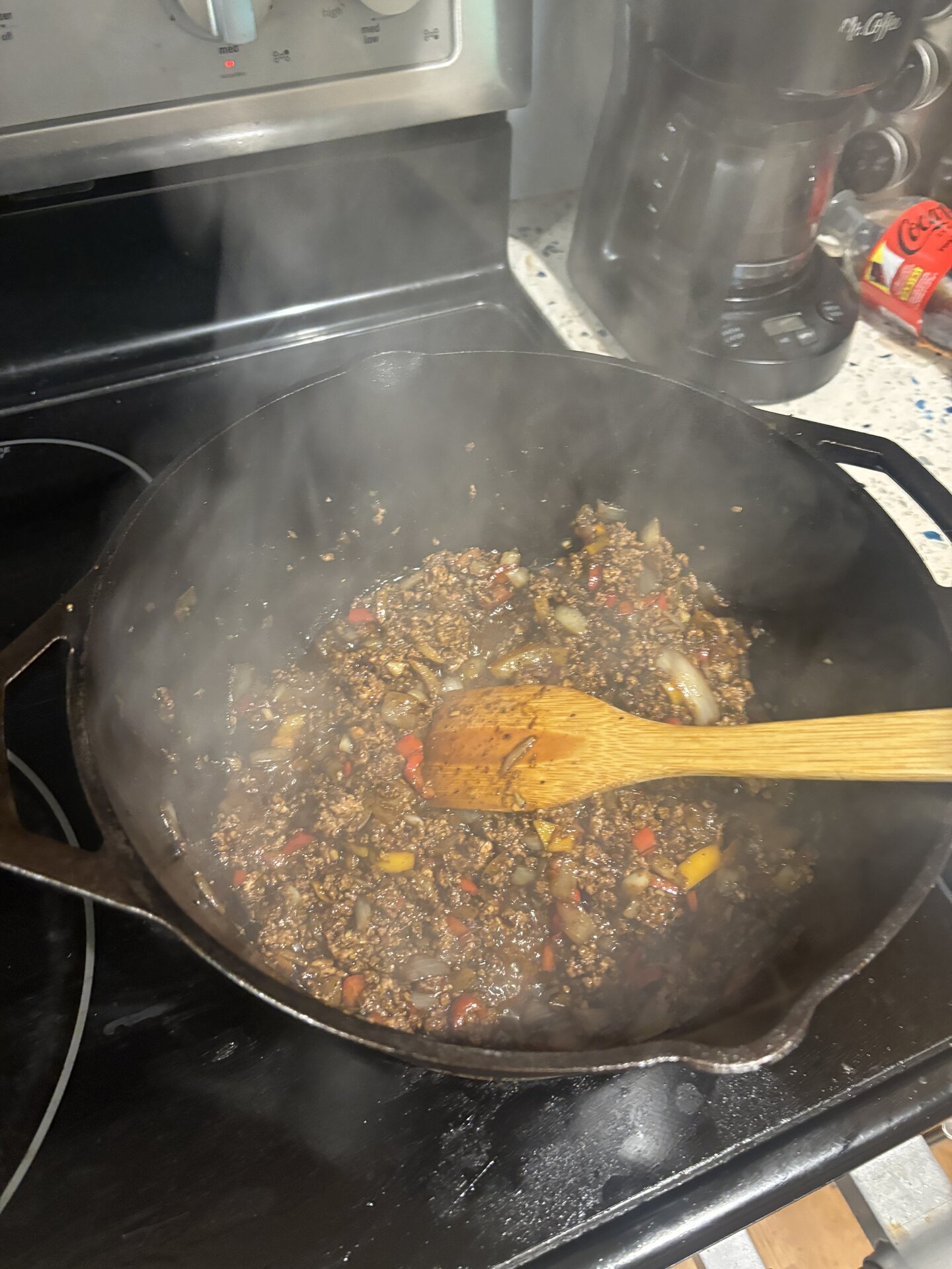Fully browned ground veal with vegetables, deep brown color